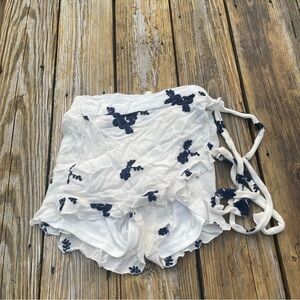 floral shorts with wrap skirt and tie